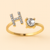 Anillo de cristal con letra personalizada