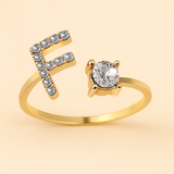 Anillo de cristal con letra personalizada