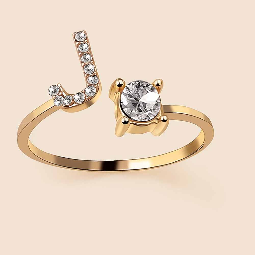 Anillo de cristal con letra personalizada