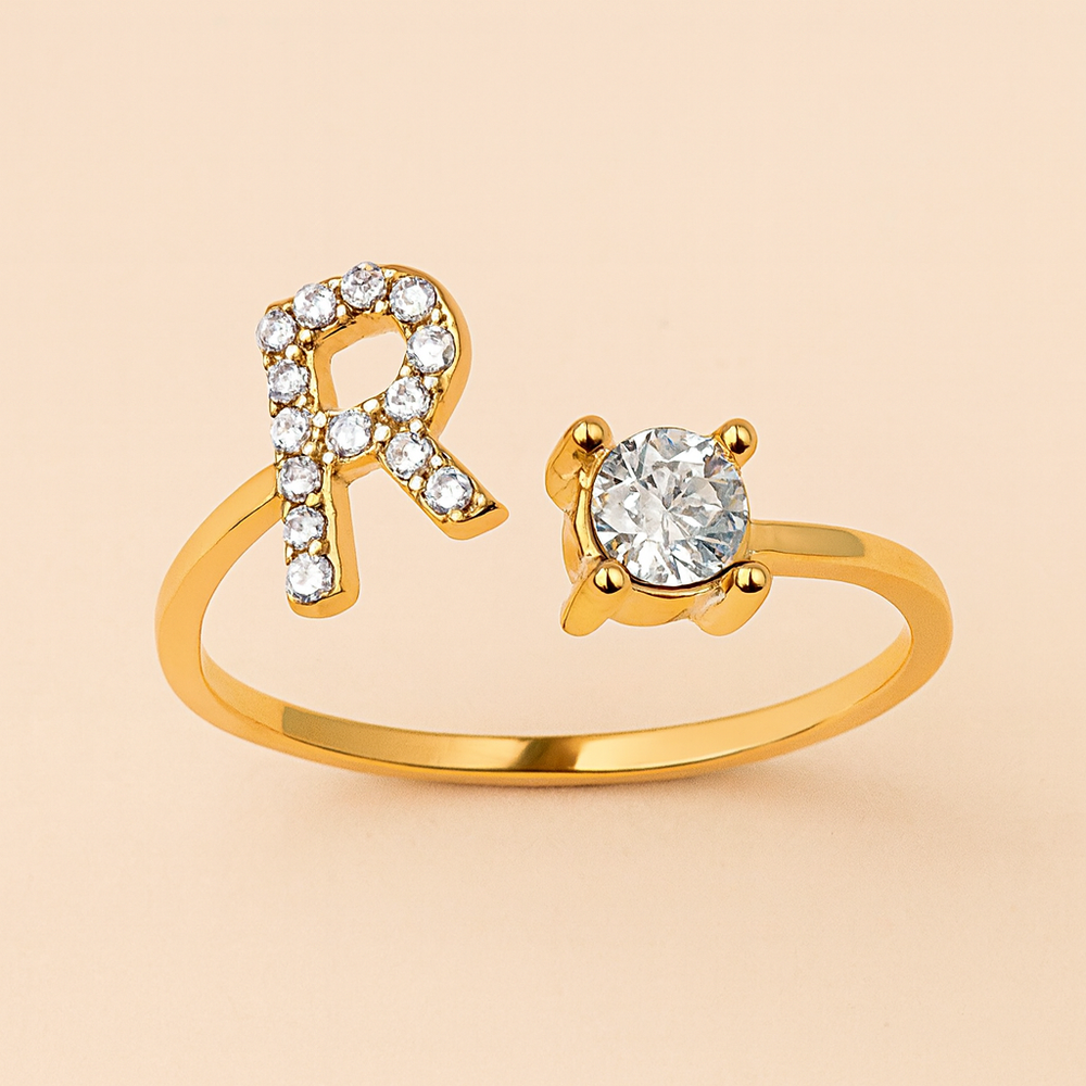 Anillo de cristal con letra personalizada