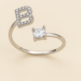 Anillo de cristal con letra personalizada