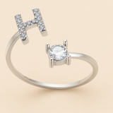 Anillo de cristal con letra personalizada