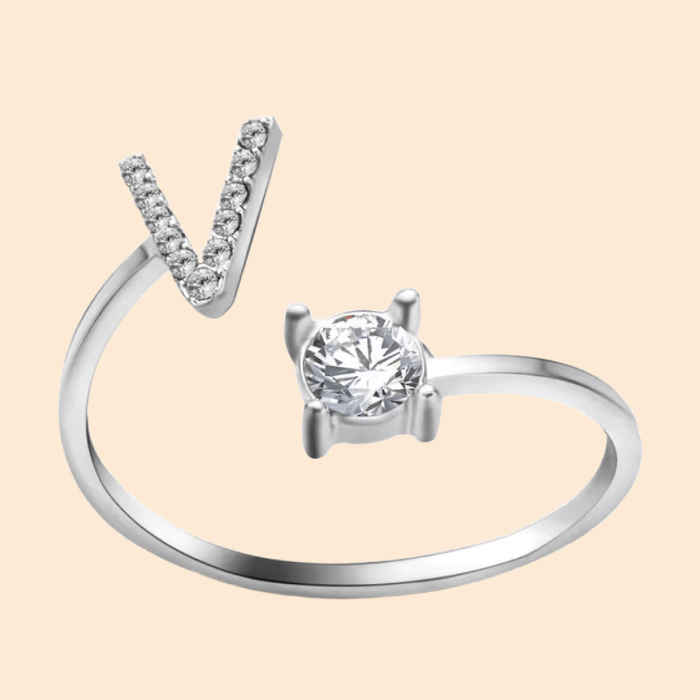 Anillo de cristal con letra personalizada